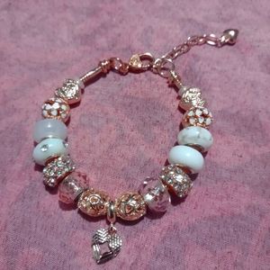 Rose gold snake chain charm bracelet with white european beads